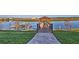 Picturesque dock on the water with kayak storage and a covered gazebo at 4547 Narrative Ln, Kissimmee, FL 34746