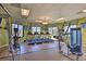 Well-equipped gym featuring treadmills and various exercise machines at 4547 Narrative Ln, Kissimmee, FL 34746