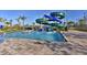 Community pool area with a water slide for Gathering fun at 4547 Narrative Ln, Kissimmee, FL 34746