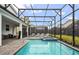 Inviting backyard pool and patio area, perfect for leisure and entertainment at 4547 Narrative Ln, Kissimmee, FL 34746