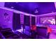 This theater room offers recliner seating, projector, and Star Wars theme at 4547 Narrative Ln, Kissimmee, FL 34746
