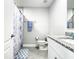 Bathroom featuring a granite vanity, toilet, and bathtub with shower curtain at 536 Bristol Cir, Kissimmee, FL 34758