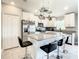Bright kitchen with stainless steel appliances, granite countertops, and a kitchen island at 536 Bristol Cir, Kissimmee, FL 34758