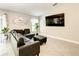 Comfortable living room with stylish sectional sofa, modern decor, and ample space for relaxing at 536 Bristol Cir, Kissimmee, FL 34758