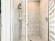 The bathroom features a glass-enclosed tile shower with sleek chrome fixtures at 536 Bristol Cir, Kissimmee, FL 34758
