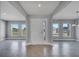 Light and airy foyer features sleek gray walls and tile flooring, plus lots of natural light at 547 Viceroy Ct, Kissimmee, FL 34758