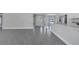 Open-concept living room boasts tile flooring, recessed lighting, and an open floor plan at 547 Viceroy Ct, Kissimmee, FL 34758