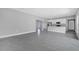 Bright open floor plan with tile floors, recessed lighting, and a kitchen at 547 Viceroy Ct, Kissimmee, FL 34758