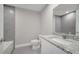 Bathroom showcasing granite vanity, and tiled shower with grey backsplash at 549 Viceroy Ct, Kissimmee, FL 34758