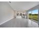 Inviting open-concept area with a modern kitchen featuring stainless steel appliances and ample counter space at 549 Viceroy Ct, Kissimmee, FL 34758