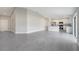 Spacious open-concept living area with modern kitchen featuring stainless steel appliances and recessed lighting at 549 Viceroy Ct, Kissimmee, FL 34758