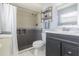 Nicely updated bathroom featuring a tiled shower with built-in niches, and modern fixtures at 609 Doheny Way, Casselberry, FL 32707