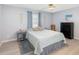 Comfortable bedroom featuring a ceiling fan, neutral colored walls, and a window offering natural light at 609 Doheny Way, Casselberry, FL 32707