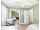 This bedroom provides large mirrored closet doors and bright colored walls at 609 Doheny Way, Casselberry, FL 32707