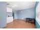 Large bonus room with AC unit, tile floors and a kitchenette at 609 Doheny Way, Casselberry, FL 32707