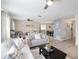 This open living room features neutral walls, new flooring, and lots of natural light at 609 Doheny Way, Casselberry, FL 32707