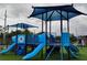 A modern, blue playground with slides offers a fun space for children to play at 609 Doheny Way, Casselberry, FL 32707