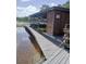 A community boathouse featuring storage for kayaks and water access at 7110 Red Lantern Dr # 23, Harmony, FL 34773