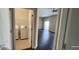 Laundry room with new white washer and dryer, conveniently located near main living area at 7110 Red Lantern Dr # 23, Harmony, FL 34773