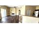 Spacious living room featuring wood floors, fireplace and sliding glass door at 7110 Red Lantern Dr # 23, Harmony, FL 34773
