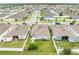 Aerial view of the home's backyard, lawn, and surrounding neighborhood at 739 Jefferson, Davenport, FL 33837