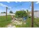 Backyard fire pit with seating and string lights at 739 Jefferson, Davenport, FL 33837