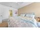 Bedroom featuring a bed, carpet and en suite bathroom with colorful accents at 739 Jefferson, Davenport, FL 33837