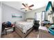 bedroom with neutral tones, a window and a ceiling fan at 739 Jefferson, Davenport, FL 33837