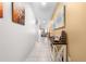 Hallway with console table and wall art leading to the living area at 739 Jefferson, Davenport, FL 33837