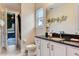 Modern bathroom with double sinks and doorway into themed bedroom, blending style and fun at 7458 Gathering Dr, Kissimmee, FL 34747