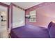 Bedroom featuring stylish decor, closet, and accent lighting at 7458 Gathering Dr, Kissimmee, FL 34747