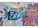 Amusement games inside game room with car-race games, offering hours of entertainment at 7458 Gathering Dr, Kissimmee, FL 34747