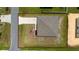 Aerial view of the home showcasing the roof and surrounding yard space at 761 Parrot Ct, Kissimmee, FL 34759