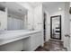 Bathroom showcasing modern vanity, neutral paint, and a shower/tub combo at 761 Parrot Ct, Kissimmee, FL 34759