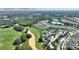 Beautiful aerial view of the community near golf course, pools, and theme parks like Disney's Magic Kingdom at 7834 Stoney Bay Loop, Kissimmee, FL 34747