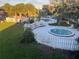 Scenic view of the inviting pool area surrounded by tropical palm trees at 7900 S Orange Blossom Trl # 2136, Orlando, FL 32809