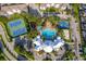 Community amenities including a large pool, tennis courts, and playground at 8112 Princess Palm Ln, Kissimmee, FL 34747