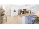 Kitchen with breakfast bar, stainless steel appliances, and tile floors at 8112 Princess Palm Ln, Kissimmee, FL 34747