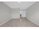 Bright living room featuring ceramic tile flooring and neutral color palette at 10957 Norcross Cir, Orlando, FL 32825