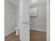 Small bathroom with a tile floor and a cabinet at 10957 Norcross Cir, Orlando, FL 32825