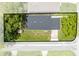 Aerial view displaying the home's roof, property lines, and surrounding streetscape at 1501 Delaware Ave, St Cloud, FL 34769