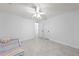 Bedroom featuring a toddler bed and neutral paint at 1501 Delaware Ave, St Cloud, FL 34769