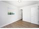 Bedroom featuring hardwood floors, and bright lighting from the window at 2806 Bonneville Dr, Orlando, FL 32826