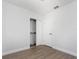 Bedroom featuring hardwood floors, bright lighting, and double door closet at 2806 Bonneville Dr, Orlando, FL 32826