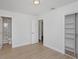 Bedroom featuring hardwood floors, closet, and full bath at 2806 Bonneville Dr, Orlando, FL 32826