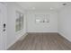 Bright living room with modern wood floors and neutral paint at 2806 Bonneville Dr, Orlando, FL 32826