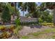 North Pointe community sign surrounded by lush landscaping and mature palm trees at 2823 Sail Breeze Way, Kissimmee, FL 34744