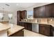 Kitchen with granite countertops and stainless steel appliances at 2823 Sail Breeze Way, Kissimmee, FL 34744