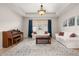 Open living room with white sofas, a piano, and large windows with light-filtering curtains at 2823 Sail Breeze Way, Kissimmee, FL 34744