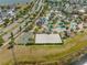 Offers an aerial view of amenities including pools, lazy river, beach volleyball, and playgrounds, ensuring fun at 4403 Scene Ln, Kissimmee, FL 34746